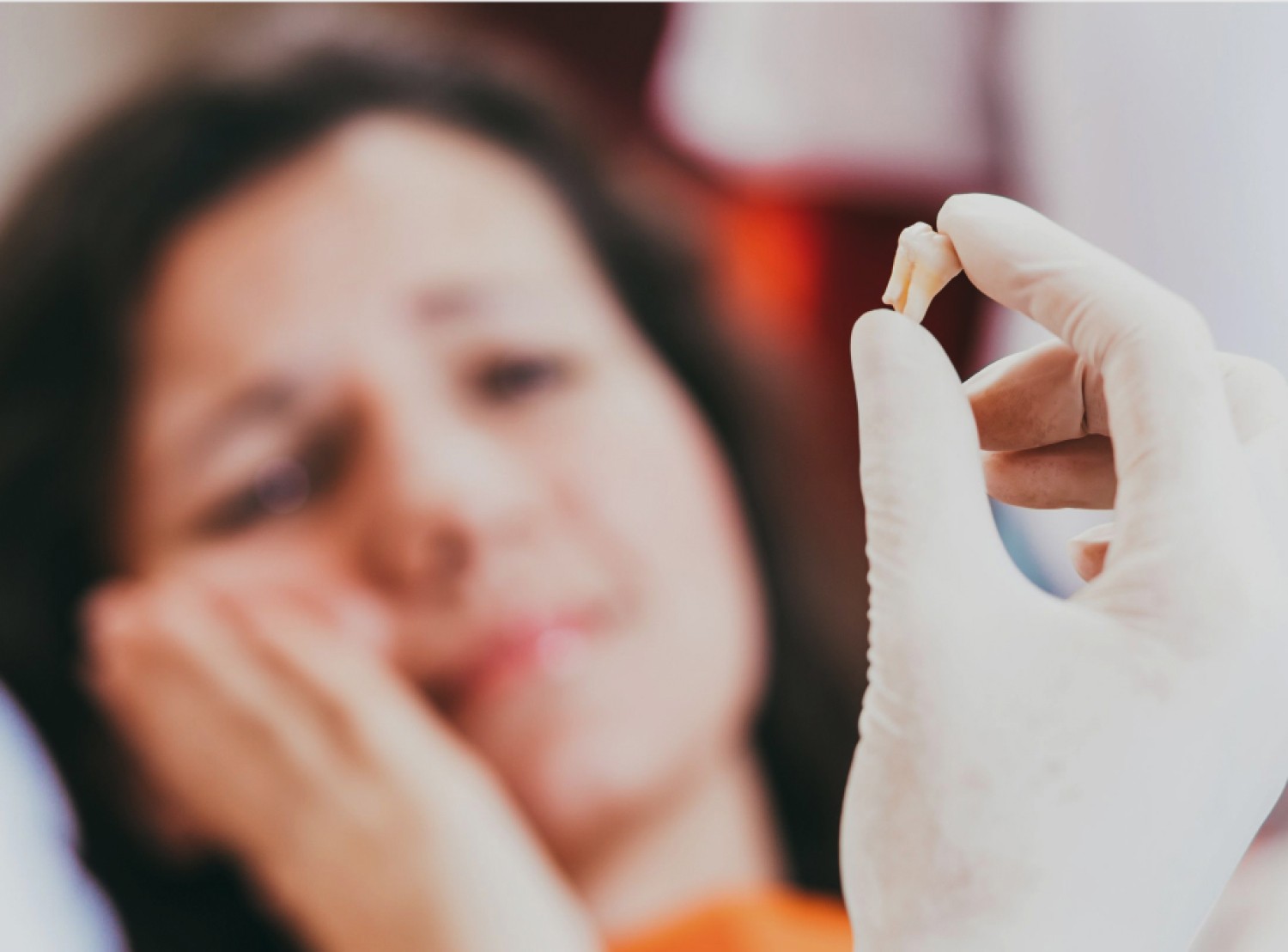 Https://Assets.Tina.Io/14718b50 C6d7 4203 99ac C8bb60660f67/Images/Services/General Tooth Extraction/Woman Being Shown Tooth.Jpeg